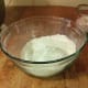 Sift your flour 3 times. Add the baking powder and set aside.