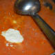 Step eight: Add a teaspoon of milk cream and a teaspoon butter. Stir once.