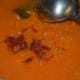 Step nine: Add kashmiri red chili powder and sugar. Add the cornflour mixture. Let the mix boil for 2 minutes. Turn off the stove. Adjust the salt. Tomato soup is ready!