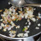 Add the onions. Sauté until they become translucent.