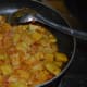 Add 1/2 a cup of water. Add the remaining salt and simmer for two minutes.