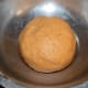 Step two: Knead, adding water little by little, to make a smooth and firm dough. Apply some oil on the surface to keep it moist. Cover the dough and set aside for 5 minutes.
