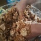 Stir in shortening. Then add peanut butter. I like to use my hands to make sure all the ingredients are mixed together well.