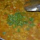 Step 10: Add chopped coriander leaves, reserving some for garnishing the curry. Turn off the stove. Mix well.
