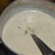 Step four: Transfer it to a saucepan. Add cardamom powder, milk, and water as per instructions. Bring the mix to a gentle boil while stirring at intervals. Turn off the stove. Done!