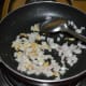 Step three: Add chopped onions. Continue sauteing till they become translucent.
