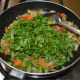 Step six: Add chopped fenugreek leaves. Stir-cook for another 4 to 5 minutes.