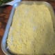 Spread the cake mix over the pumpkin layer.