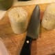 Slice tube of Polenta in half and gently squeeze contents onto a cutting board