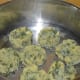 Steam cook them for 12 minutes. Turn off the heat. Collect the baskets on a plate.
