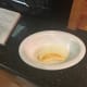 1. (Continued) Dip the banana slices in egg whites to prepare them to be fired.