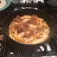 4. Add the bananas and fry them, sprinkling with sugar until brown on both sides. Try your best to not break the banana slices, although this is often hard. Use a spatula to turn as necessary.