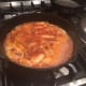 5. Add the orange juice and cook longer.