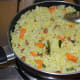 Step five: Your favorite lemon rice with diced carrots is ready.