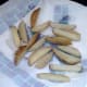 Once fried chips are drained on kitchen paper
