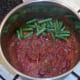 Green beans are added to curry sauce