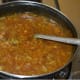 Step six: Add red chili flakes/powder, pepper powder, and soy sauce. Stir the mix.