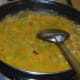 Step five: Add corn flour mixture. Continue boiling the mix till you get the right consistency.