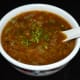 Step eight: Pour the soup equally into three bowls. Garnish with a few chopped coriander leaves. Sip it hot!