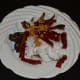 Grated coconut, tamarind, and the fried masala ingredients.