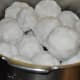 Make fist-sized balls when the mix is very hot. Apply water to your fingers so that the mix won't stick to them. Steam-cook these balls for 15–18 minutes.