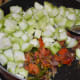 Step five: Throw in ridge gourd cubes. Stir-cook for 2-3 minutes.