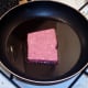 Starting to fry sausage