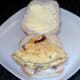 Omelette is laid on bread roll