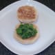 Rocket leaves on toasted roll