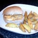 Double cheese and onion crisps sandwich and spicy wedges ready for service