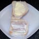Sea bass flesh is arranged on bread roll