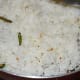 Step three: Add cooked rice. Mix well.