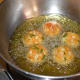 Step three: Divide the dough into many lemon-sized balls. Deep fry them in batches of 5-6.