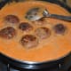 Step ten: Add the koftas. Boil the mix for 3-4 minutes. Now the koftas become tender. Tun off the heat. Transfer this side dish to a serving bowl.