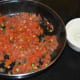 Step eight: Grind the cooked ingredients and cashew nut mixture together. Make a smooth paste. Add some water if needed.