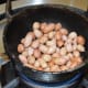 Step two: Roast peanuts. Remove the skin when they cool down.