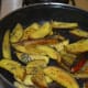 Step five: Stir-cook while sprinkling in some water till they become soft.