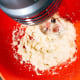 Beat butter and sugar with a hand mixer until creamy.