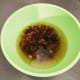 Soak dates with baking soda and boiling water in a bowl for 15 minutes.