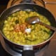 Step six: Throw in jaggery powder. Add remaining salt. Stir-cook the mix till the water is completely absorbed.