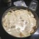 Pour batter evenly over apples.