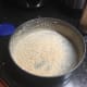 Butter pan and dust with bread crumbs.