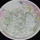 Step three: Add sliced cucumbers and red onions. Stir well. Your German cucumber salad is ready! Use it as-is or refrigerate it for an hour before serving.