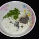 Step two: Put sour cream or yogurt, chopped dill leaves, roasted mustard seeds, vinegar, milk, salt, and pepper powder in a mixing bowl. Whisk them nicely.