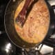 When this is done, add in the onions over it, and just before serving add in the cilantro, freshly ground black pepper, 1 teaspoon cinnamon, and the 3/4 teaspoon salt.