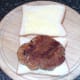 Spiced pork steak on bread