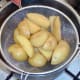 Parboiled chips are drained