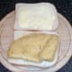 Omelette is laid on bread