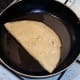 Omelette is folded in half