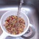 Washing mixed bean salad